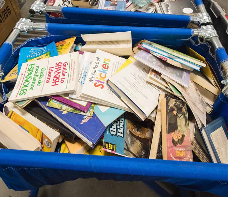 books in a donation bin