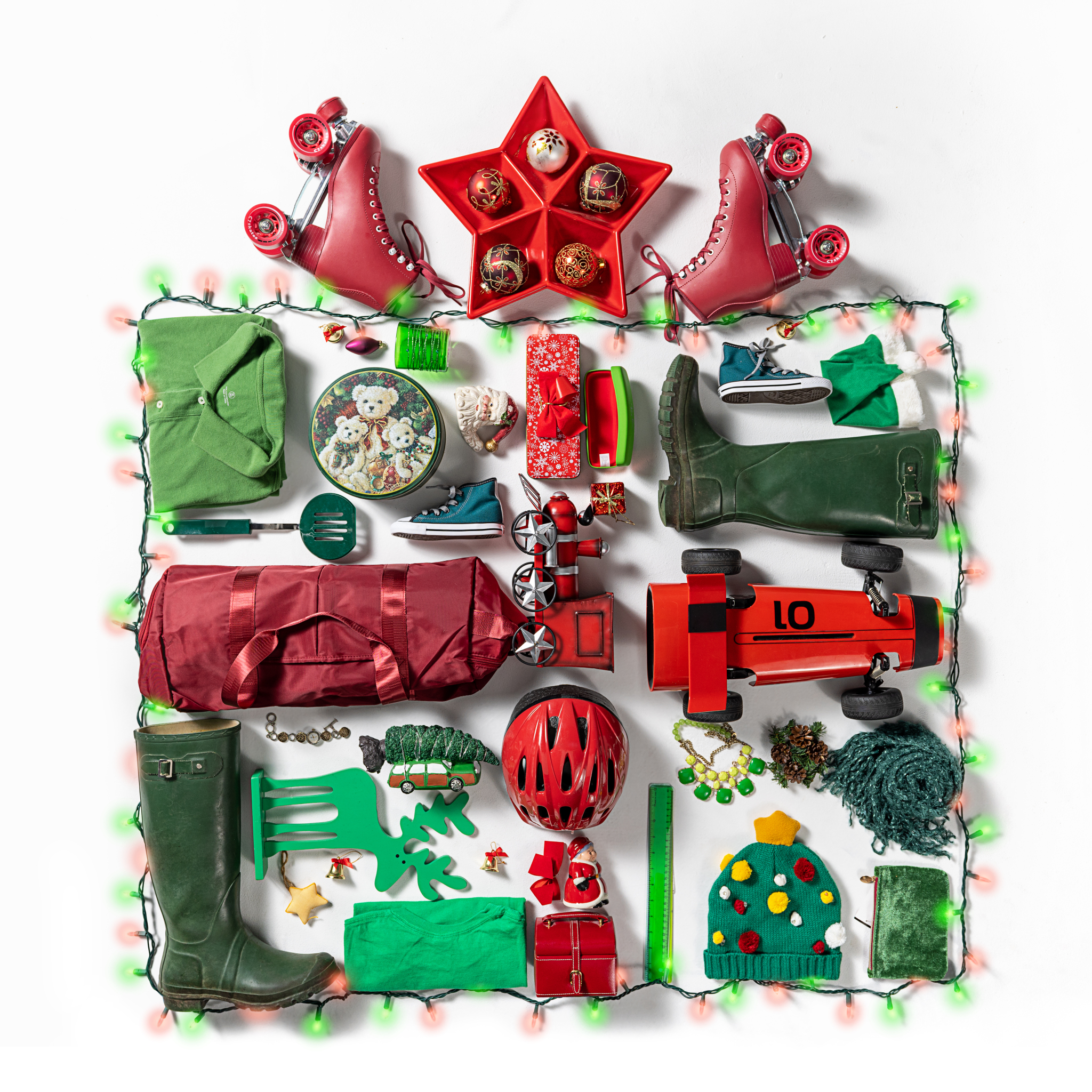 A bunch of donated items that form the shape of a Christmas present.